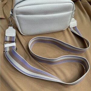 Stylish White Crossbody Bag with Striped Strap